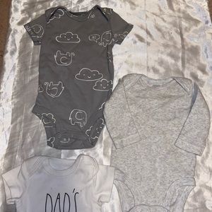 3 baby onesies